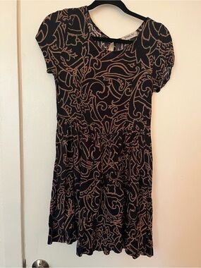 Anthropologie Black Mini Dress with Tan Floral Swirl Pattern